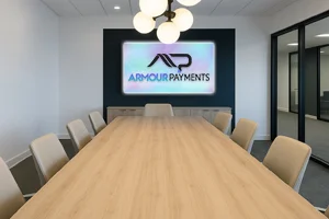 Armour Payments team collaboration in modern office environment